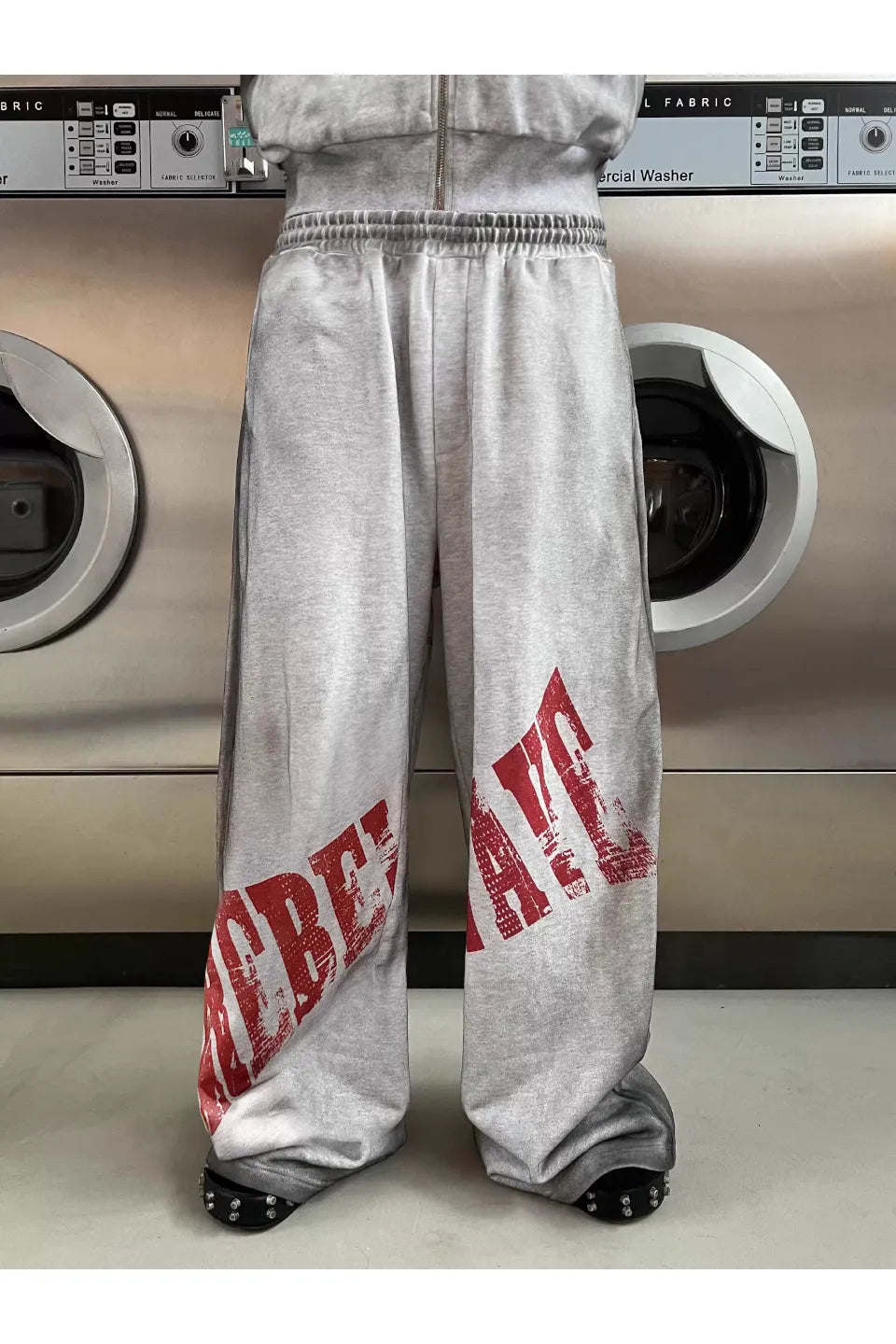 Distressed Reversible Slogan Sweatpants