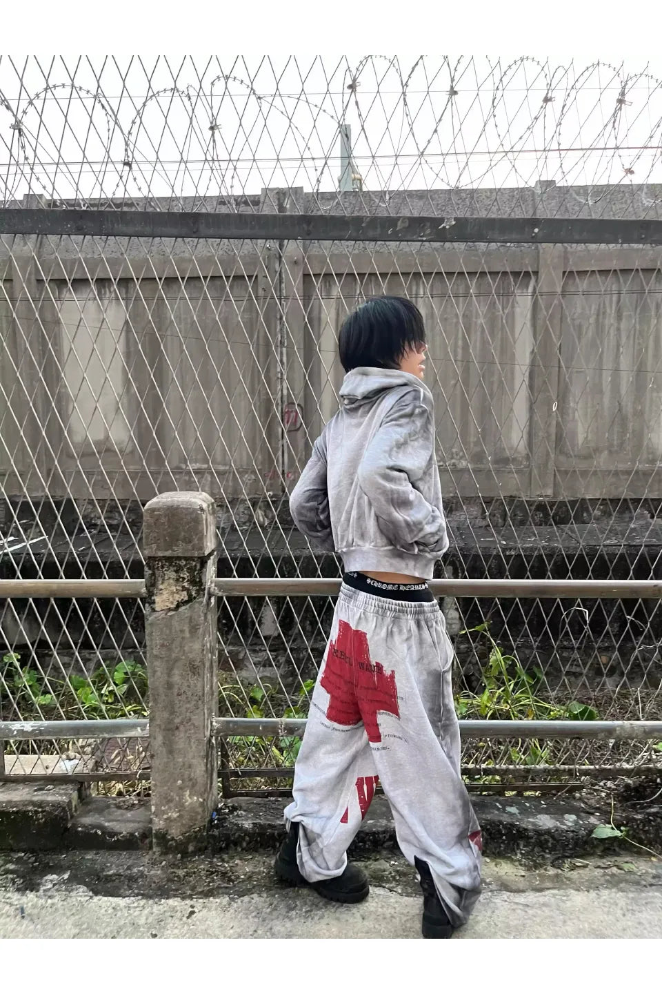 Distressed Reversible Slogan Sweatpants