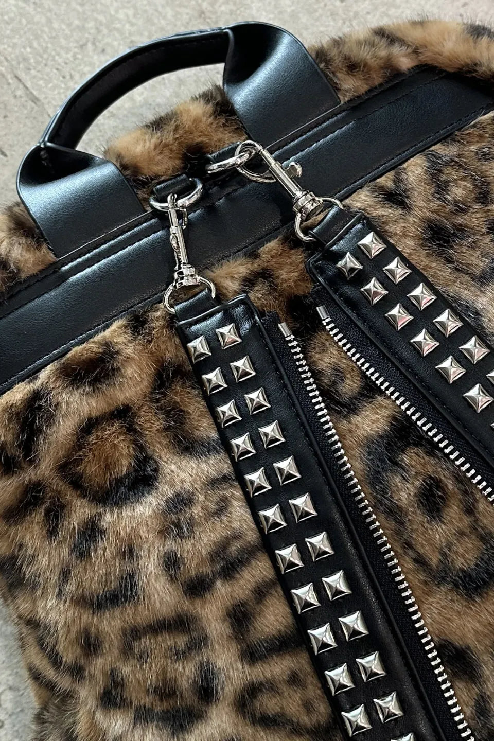 Studded Two Tone Pierced Leopard Backpack