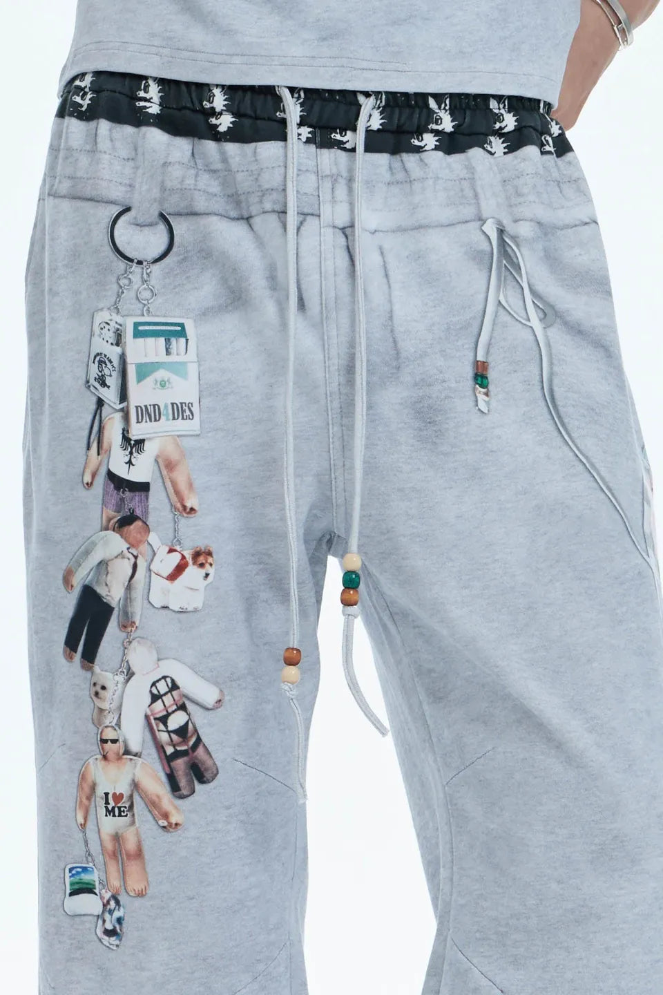 国内で当店のみ DND4DES - Graphic Double-Waist Sweatpants DND4DES Doll Charm Graphic Double-Waist Sweatpants