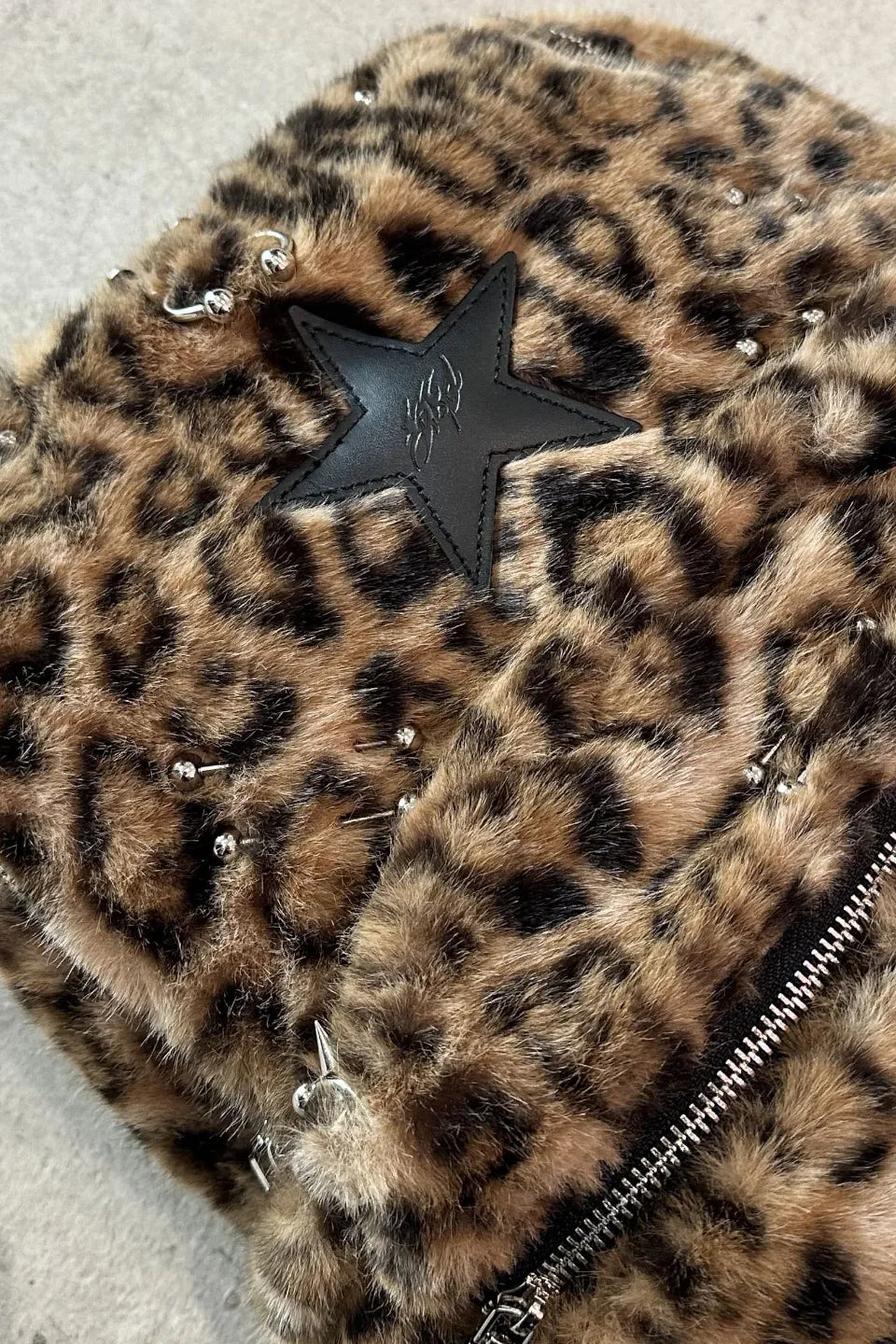 Studded Two Tone Pierced Leopard Backpack