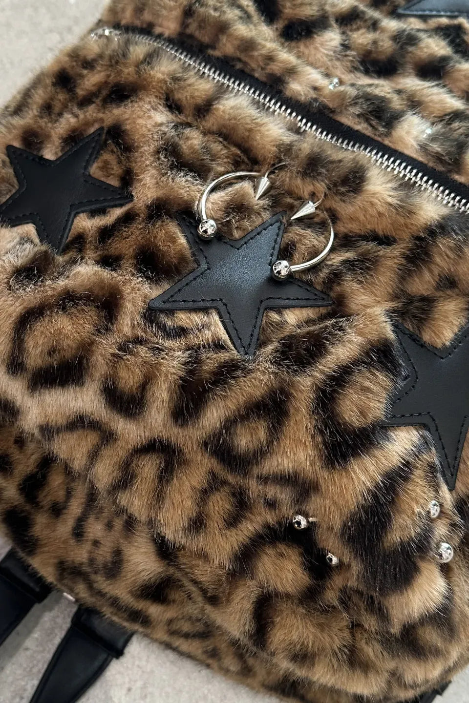 Studded Two Tone Pierced Leopard Backpack